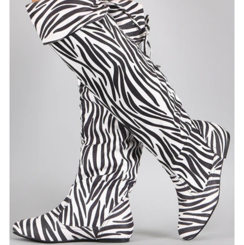 Women over the knee zebra boots
